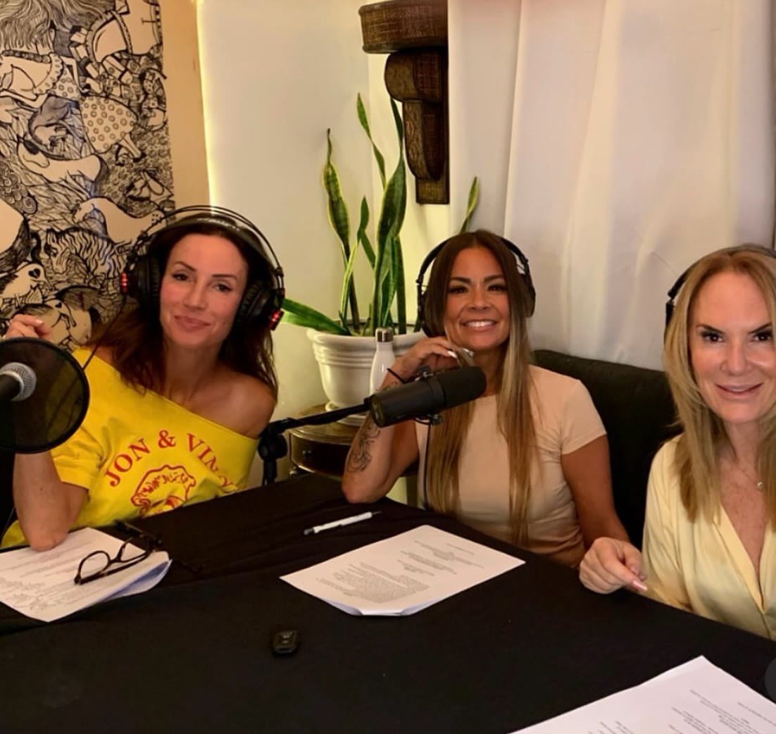 Amanda recording a podcast with two hosts